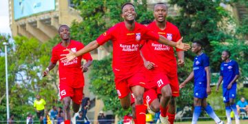 Beja Nyamawi (center)