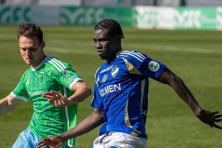 Kojo Peprah Oppong (right)